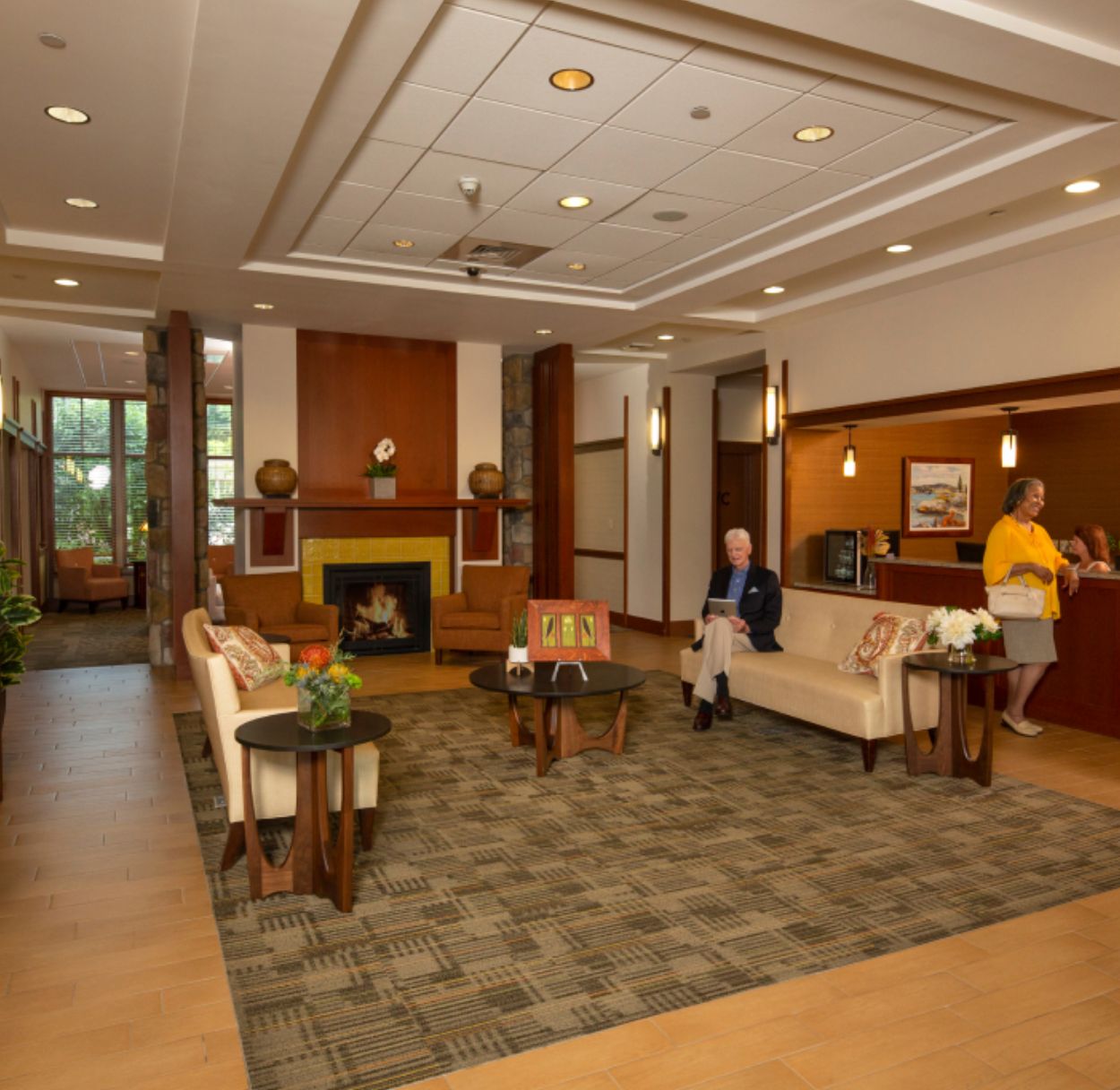 Senior living community interior at Waterstone At Welley, featuring elegant decor and furniture.