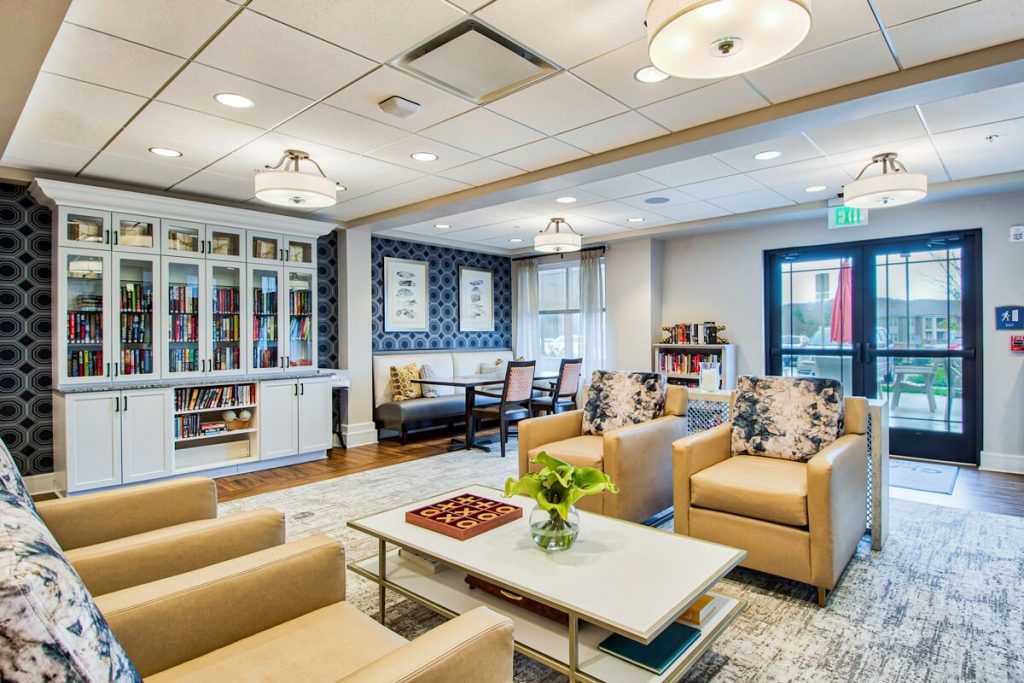 Interior view of Clarendale At Bellevue Place senior living community with modern decor.