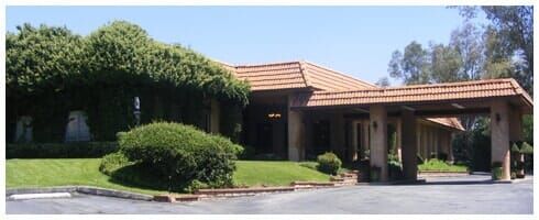 Braswells Yucaipa Leisure Manor, a senior living community with villa-style housing and lush lawns.