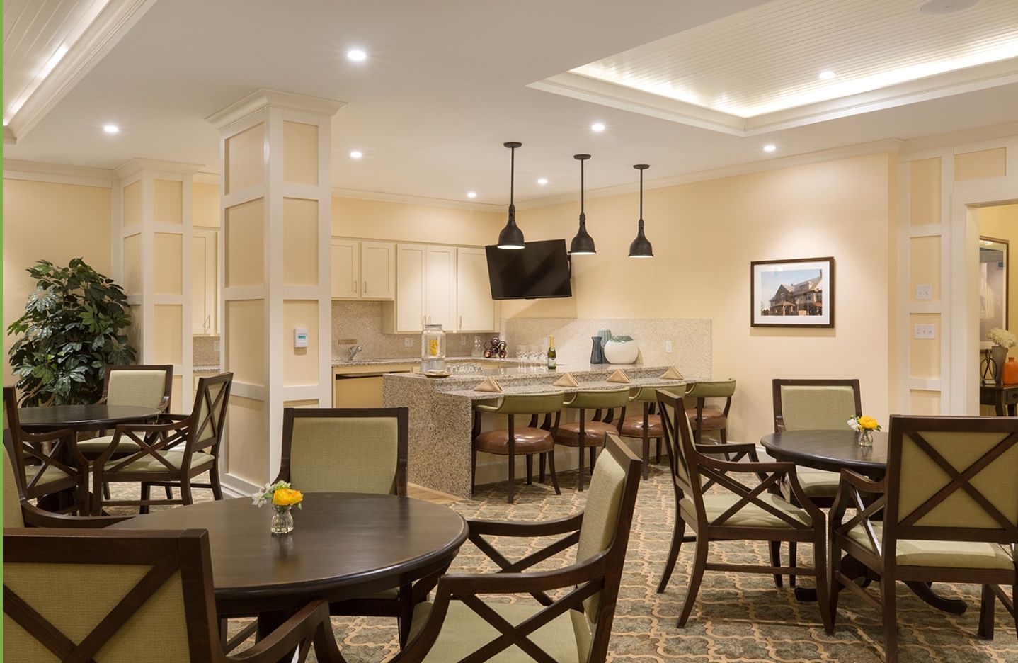 Senior living community, The Residence at Orchard Grove, featuring dining room, kitchen, and modern decor.