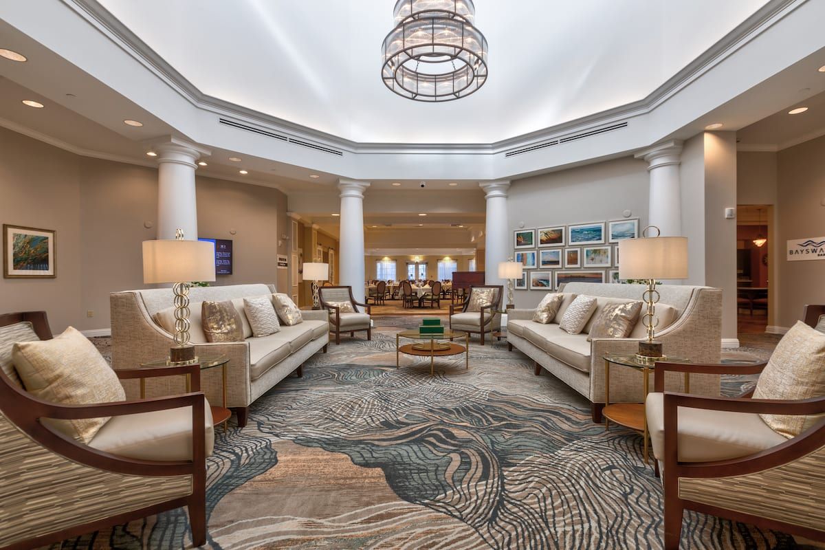 Elegant interior of Aston Gardens At Tampa Bay senior living community with modern decor.