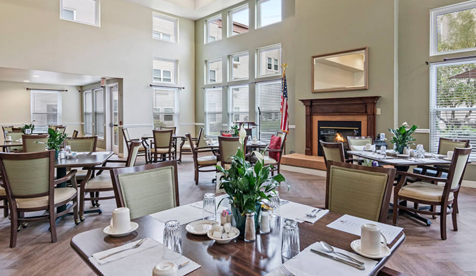 Interior view of Seaton Voorhees senior living community featuring dining room, lounge and coffee area.