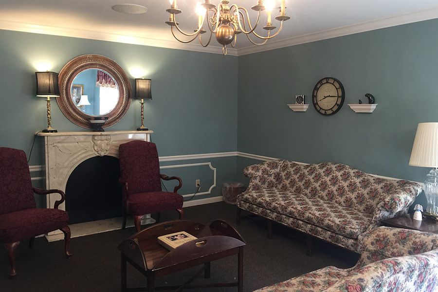 Interior view of Evansville Protestant Home's reception room with elegant furniture and decor.