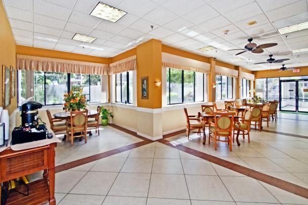 Interior view of Lake Howard Heights senior living community featuring dining area and foyer.