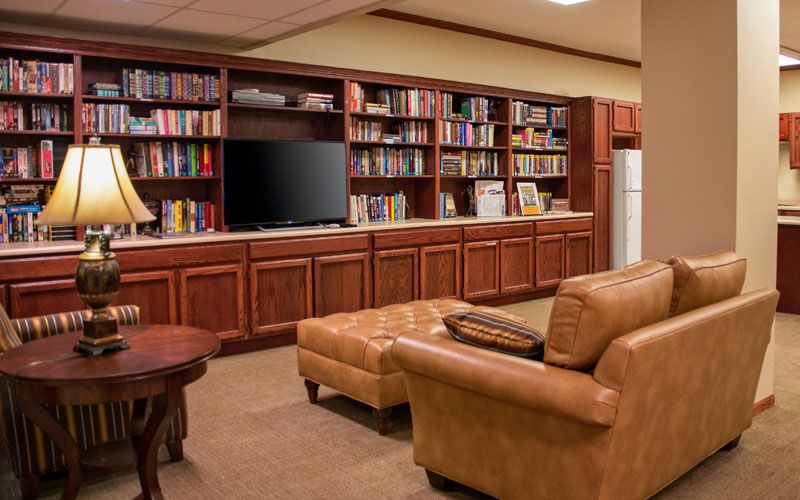 Interior view of Bickford of Peoria senior living community featuring modern electronics and furniture.