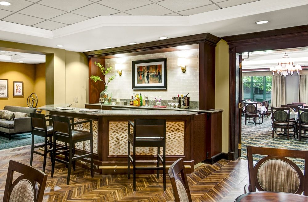 Senior living community Lincolnwood Place featuring elegant architecture, dining room, and decor.
