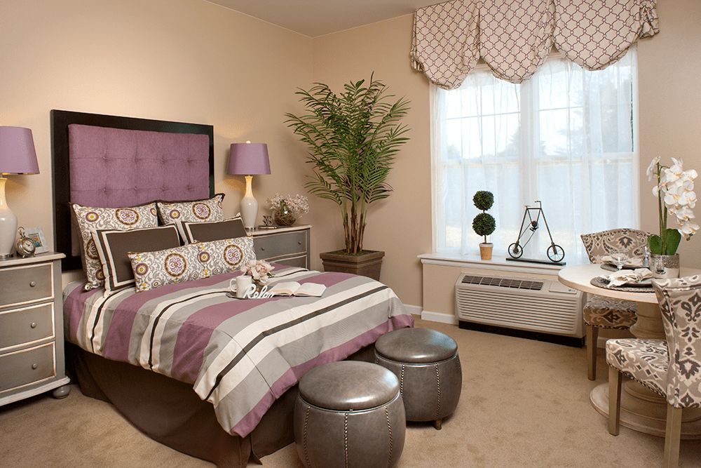 Interior design of a bedroom in MorningStar senior living community, Fort Collins, featuring home decor.