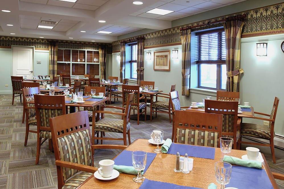 Interior view of Alexian Village Elk Grove senior living community featuring dining area and decor.