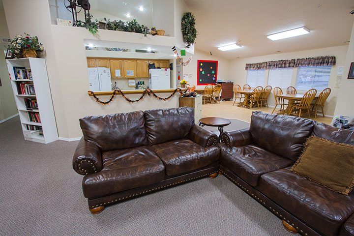 Ashley Manor Cedar senior living community interior featuring cozy furniture and modern appliances.