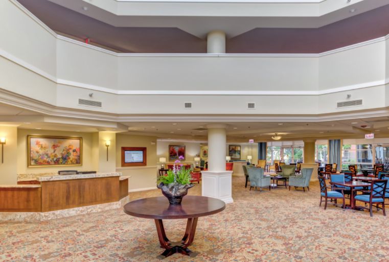 Interior view of The Moorings of Arlington Heights senior living community featuring modern furniture and design.