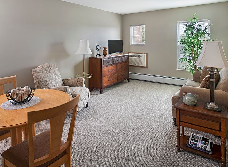 Interior view of American House Cedarlake senior living community featuring modern decor and amenities.
