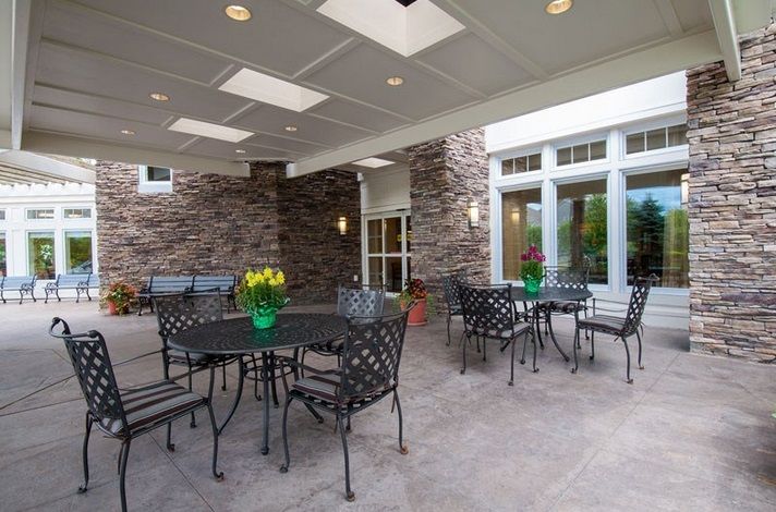 Interior view of Brookhaven At Lexington senior living community featuring dining area and furniture.