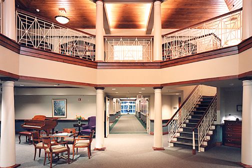 Interior view of Ave Maria Home Assisted Living featuring elegant architecture and furnishings.