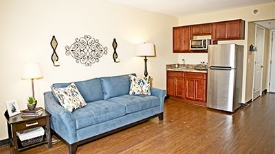 Interior view of Skyline Village at Red Mountain senior living room with modern decor and appliances.