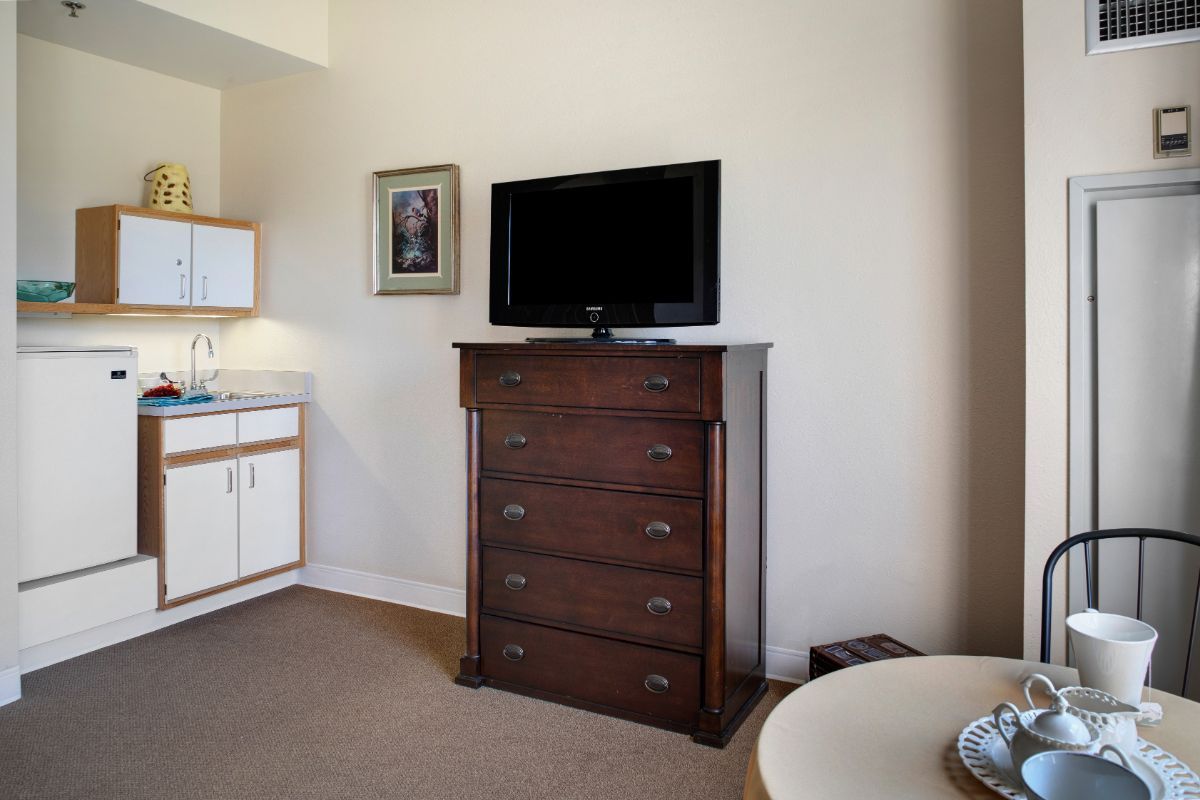 Interior view of Brighton Gardens of Wheaton senior living community with modern electronics and furniture.
