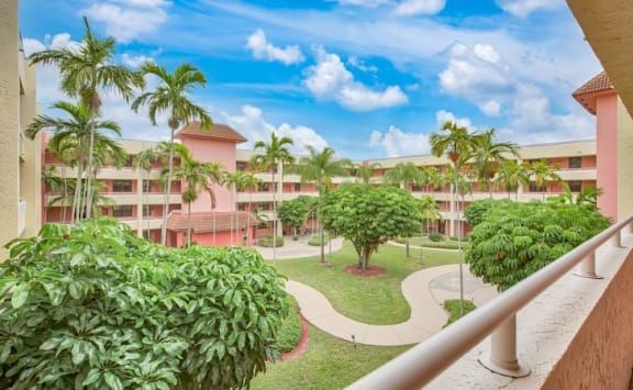 Elison Independent Living of Lake Worth, a senior living resort with modern architecture.