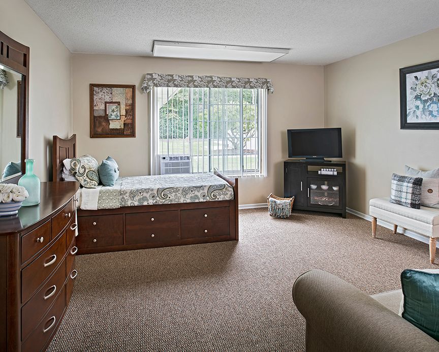 Interior view of American House Livonia senior living community featuring modern decor and amenities.