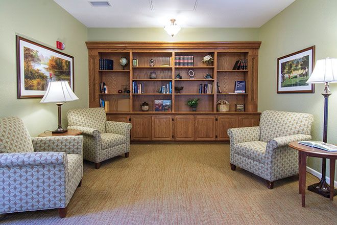 Interior view of Brookdale Fort Collins senior living room with stylish furniture and home decor.