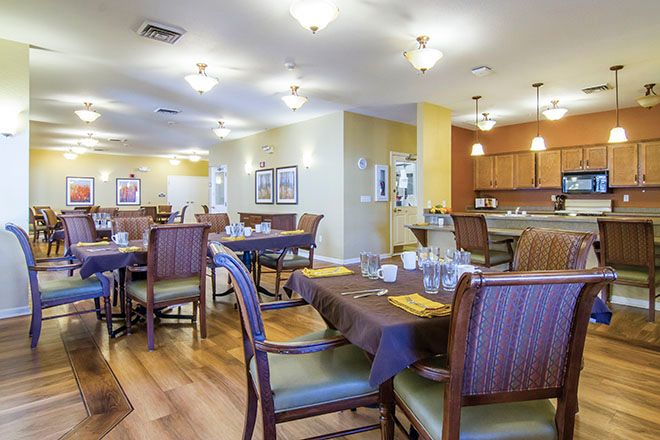 Interior view of Brookdale Fort Collins senior living community featuring dining room and café.