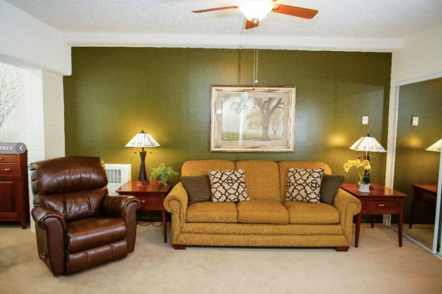Senior living room interior at Rowntree Gardens with modern furniture and home decor.