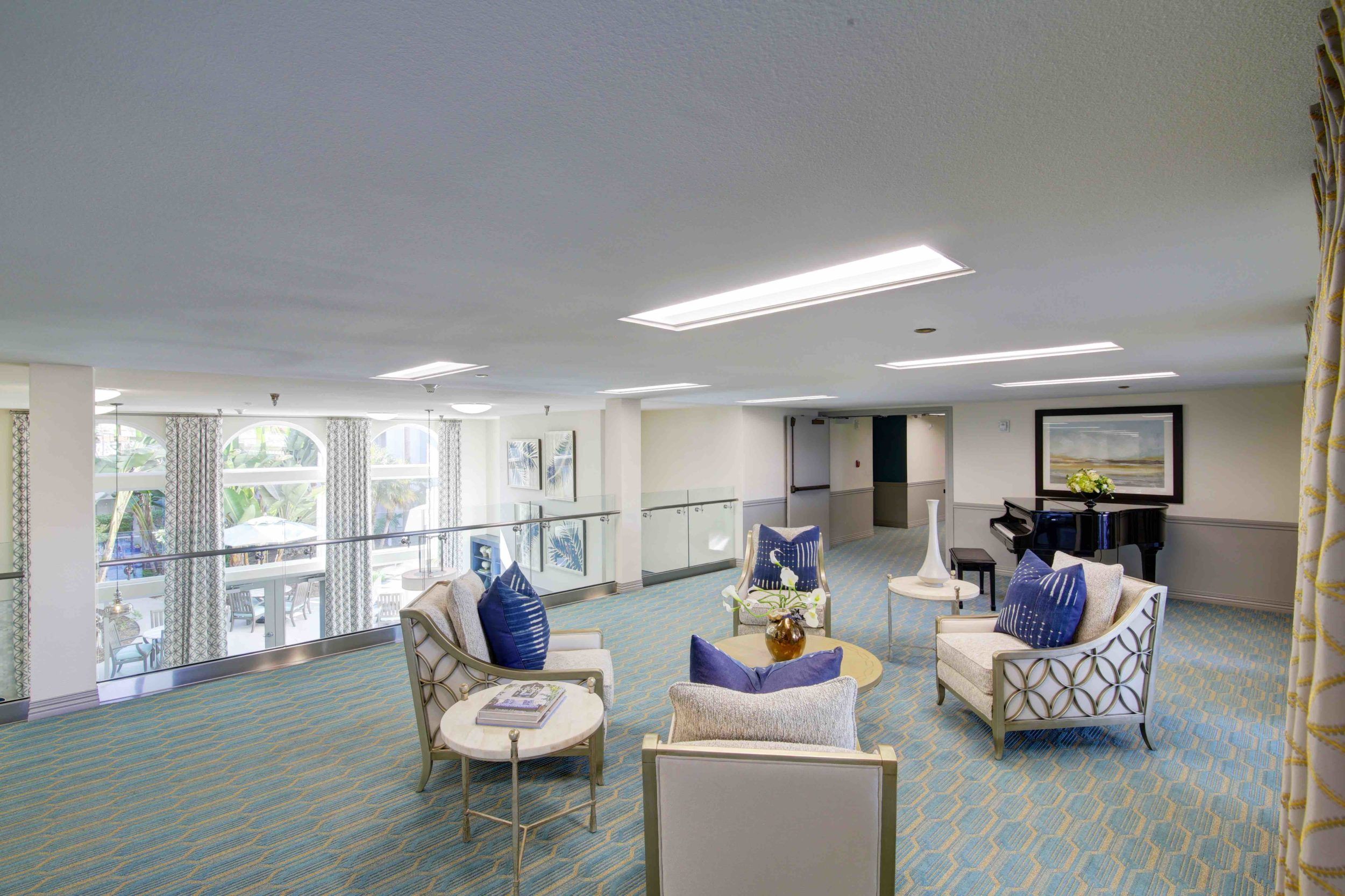 Coastal Heights Senior Living community featuring a welcoming reception room with elegant decor.