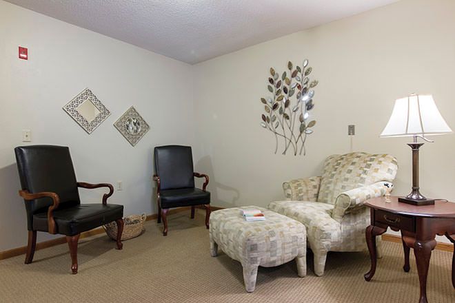 Interior view of Brookdale Falling Creek senior living community featuring furniture and home decor.