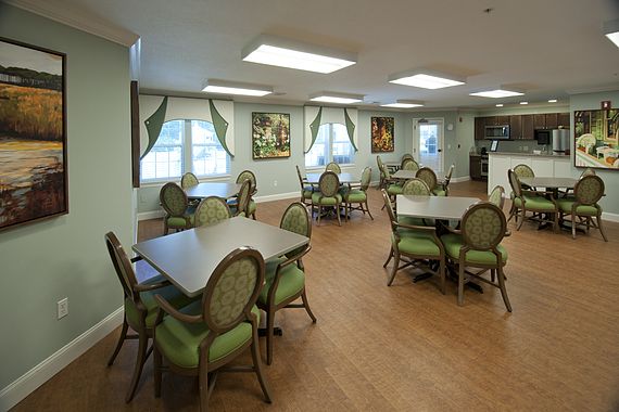 Interior view of Allegro St. Augustine senior living community featuring dining and reception areas.