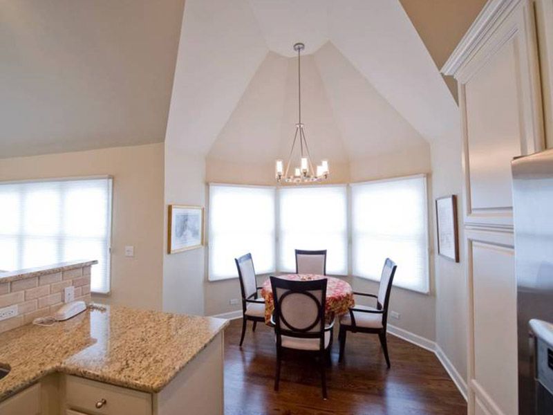 Interior view of Wyndemere senior living community featuring elegant dining room design.