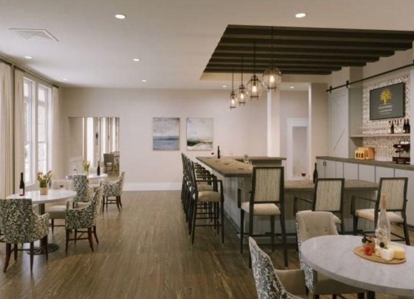 Interior view of Brightmore of East Memphis senior living community featuring dining room and bar area.