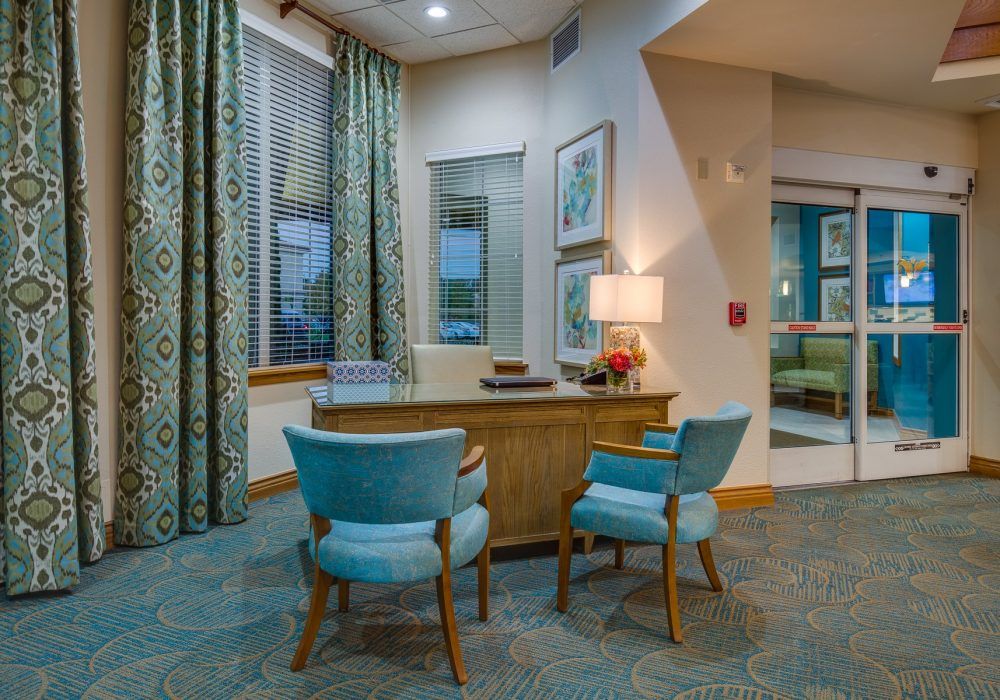 Interior view of Fairwinds Ivey Ranch senior living community featuring elegant furniture and decor.
