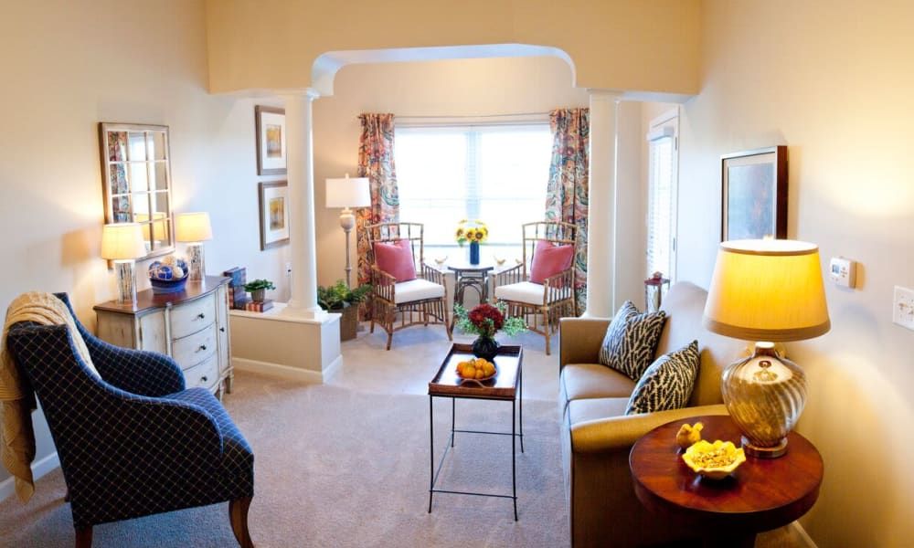 Senior living room at Keystone Place At Terra Bella with elegant furniture and home decor.