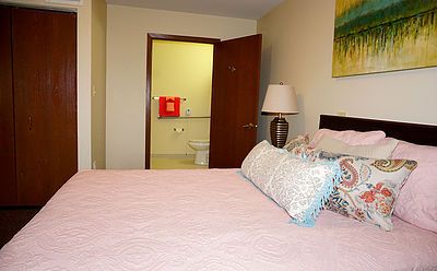 Comfortable and stylish bedroom interior at 3801 Grand senior living community.