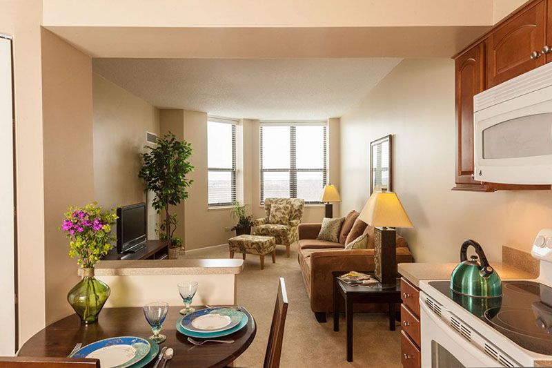 Interior view of Oak Trace senior living community featuring modern decor, appliances, and electronics.
