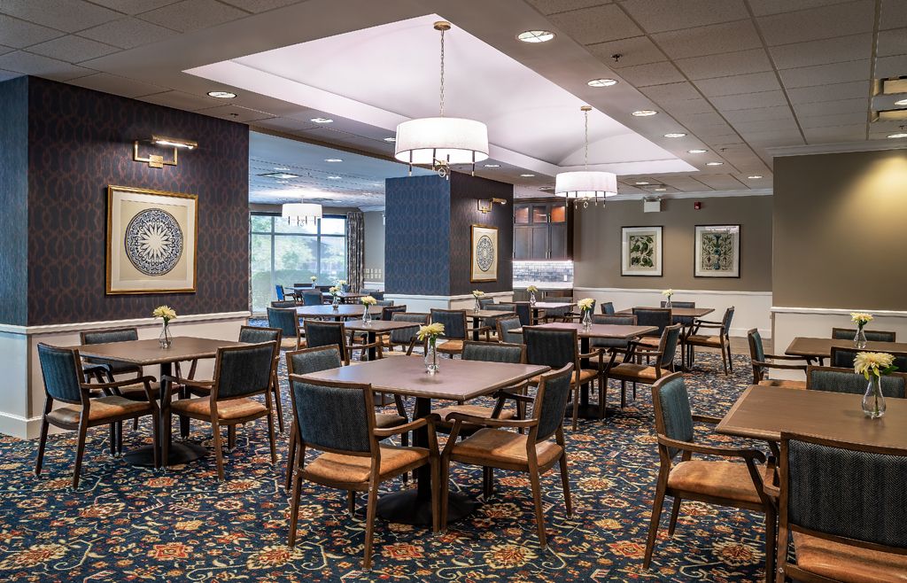 Interior view of Autumn Green at Wright Campus senior living community featuring dining area.