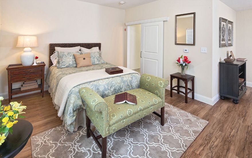 Interior view of The Village at The Triangle senior living community featuring cozy decor.