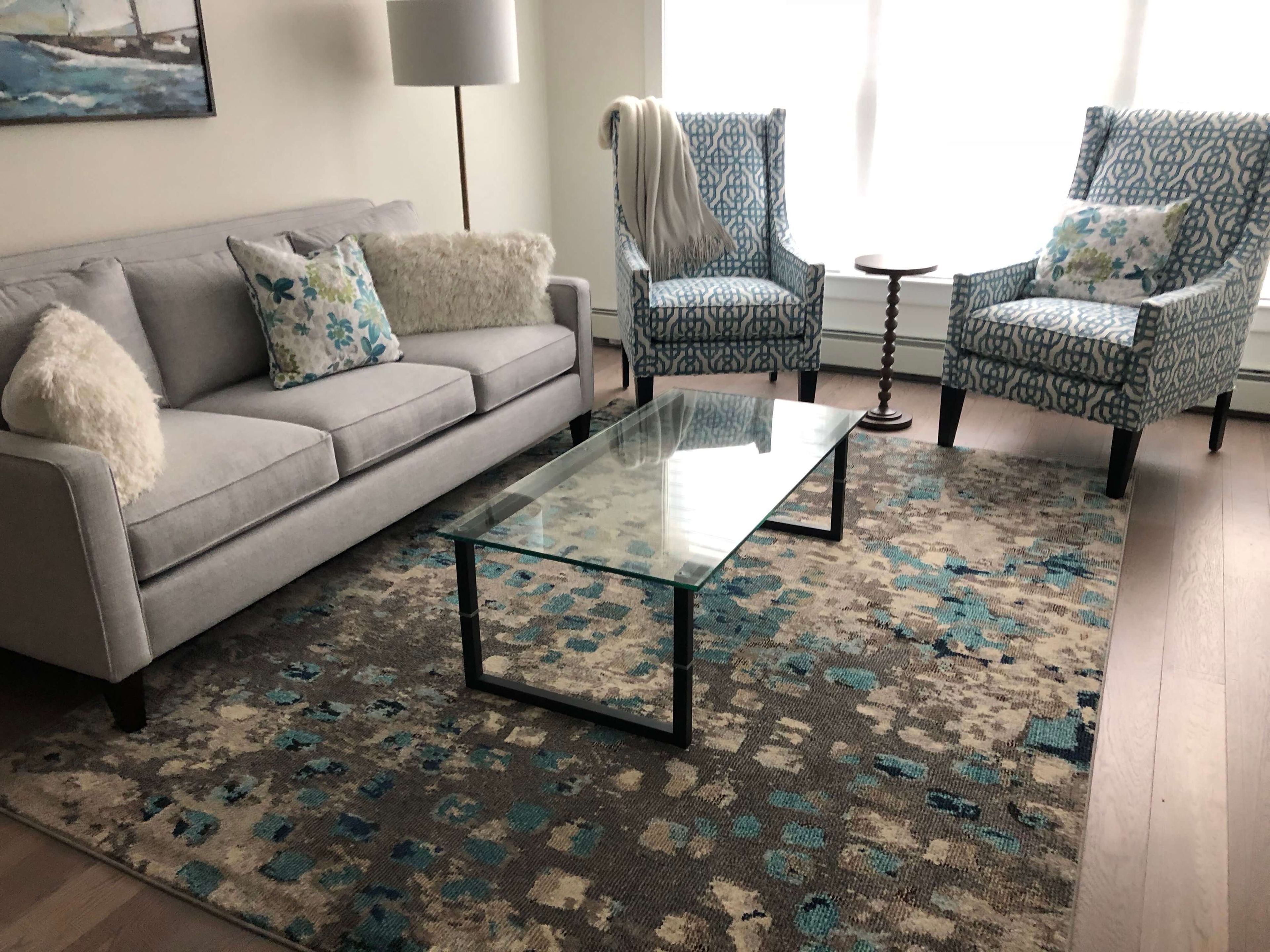 Senior living community Lasell Village featuring stylish furniture, home decor, and a cozy living area.