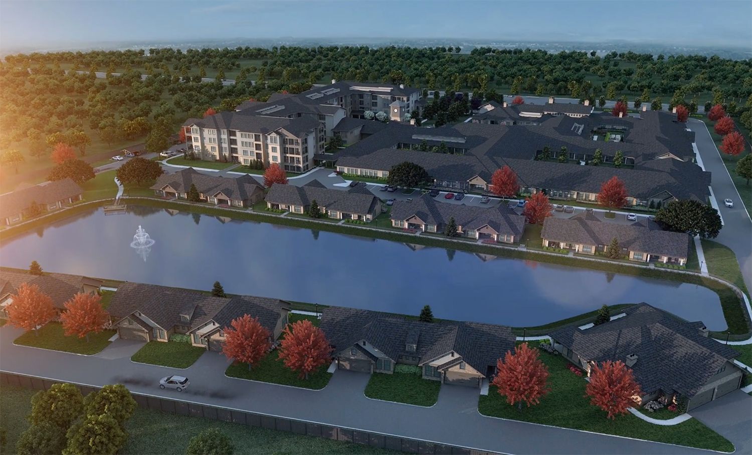 Aerial view of The Lodge at Pine Creek senior living community, showcasing its architecture and outdoor surroundings.