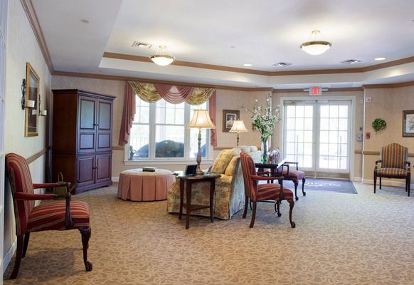 Interior view of Sunrise of Cresskill senior living community featuring modern decor and furniture.