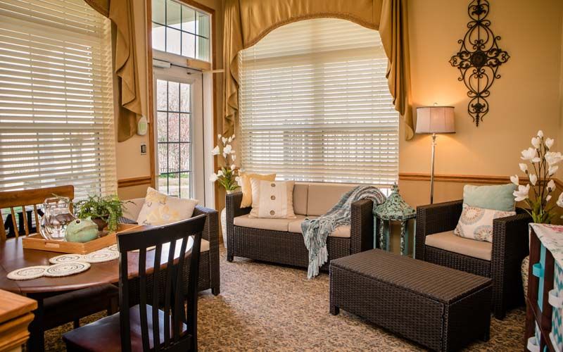 Interior view of Bickford Macomb Cottage senior living community featuring cozy decor.