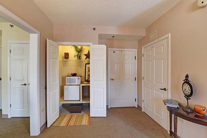 Interior view of Dimensions Living Burr Ridge senior community featuring modern appliances and decor.