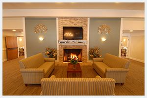 Interior view of Delta Retirement Center featuring a cozy living room with modern decor and electronics.