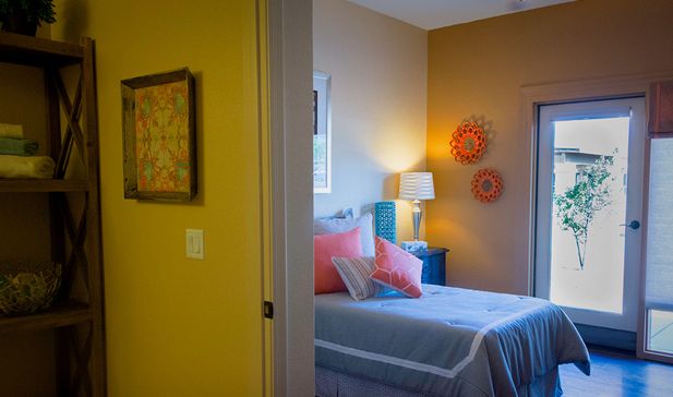 Interior view of a furnished bedroom at Via Elegante Senior Living Community in Sierra Vista.
