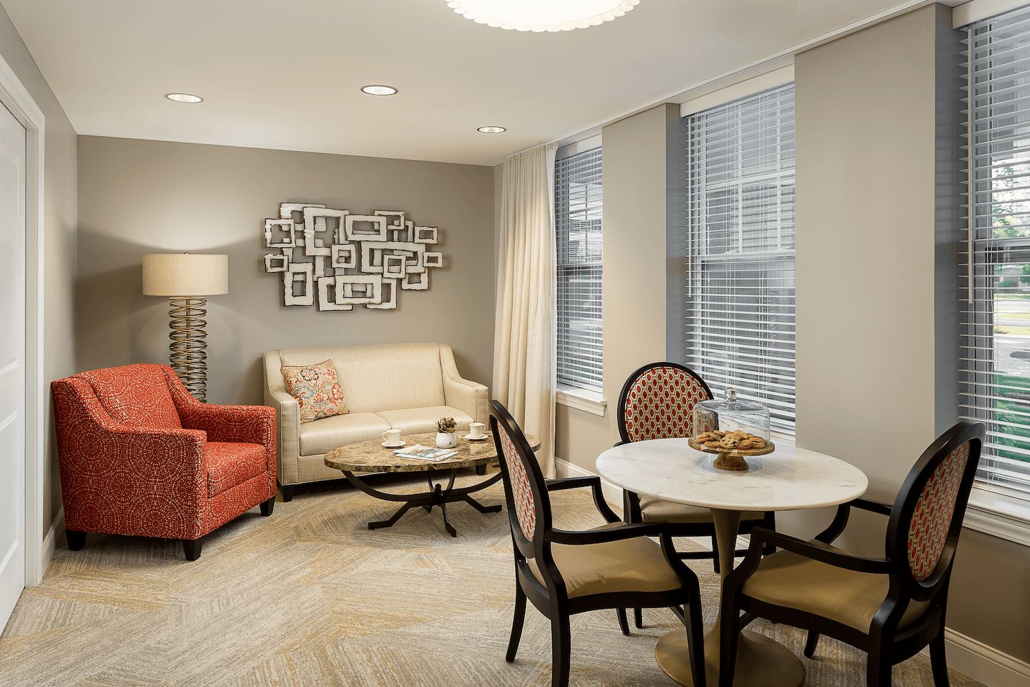 Interior view of Arbor Terrace Glenview senior living community featuring elegant decor and furniture.
