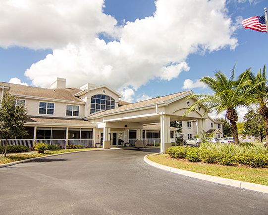Senior living community, Brookdale Highlands, featuring suburban architecture and transportation.