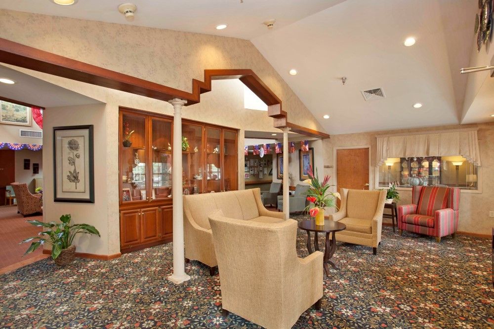Senior living community American House Jackson, featuring elegant interior decor, furniture, and artwork.