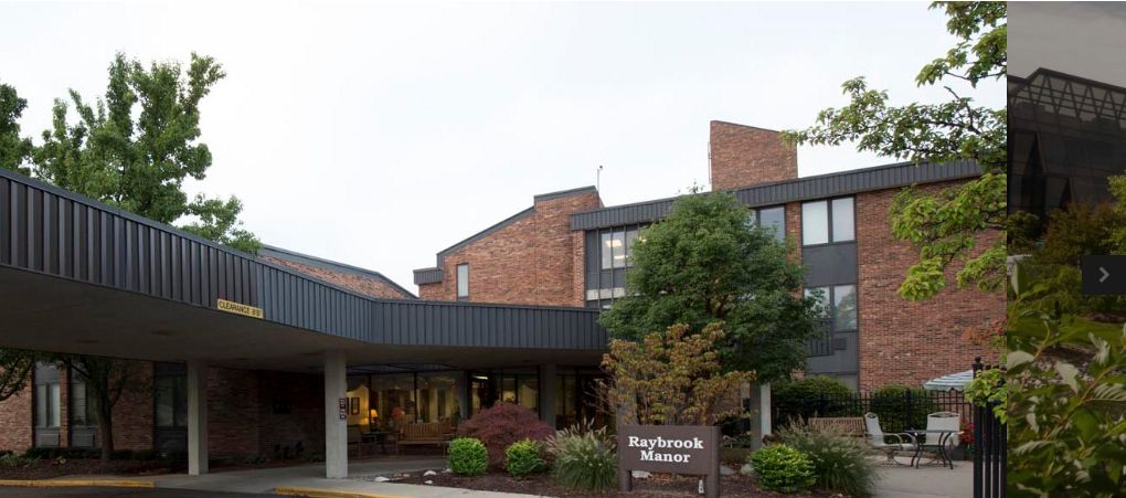 Raybrook Manor at Holland Home, a senior living community with urban architecture and greenery.