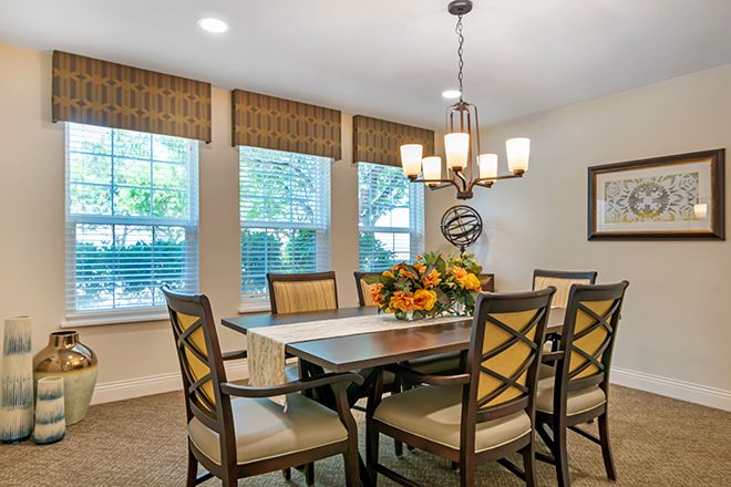 Interior view of Brookdale Twin Falls senior living community featuring dining room with elegant decor.