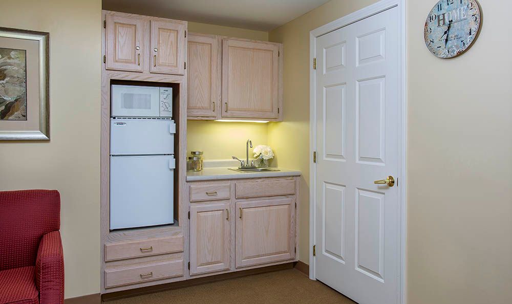 Interior view of a modern kitchen in Benchmark Senior Living at Shrewsbury Crossings.