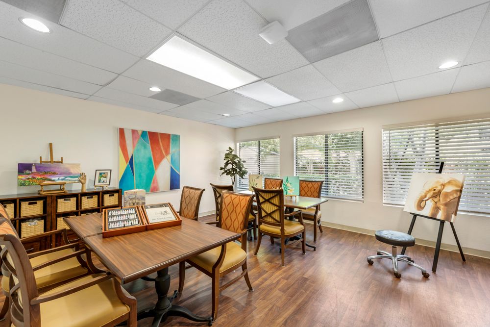 Interior view of Brookdale South Bay senior living community featuring hardwood floors and furniture.
