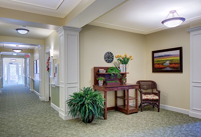Interior view of Brightview Fallsgrove senior living community featuring modern furniture and design.